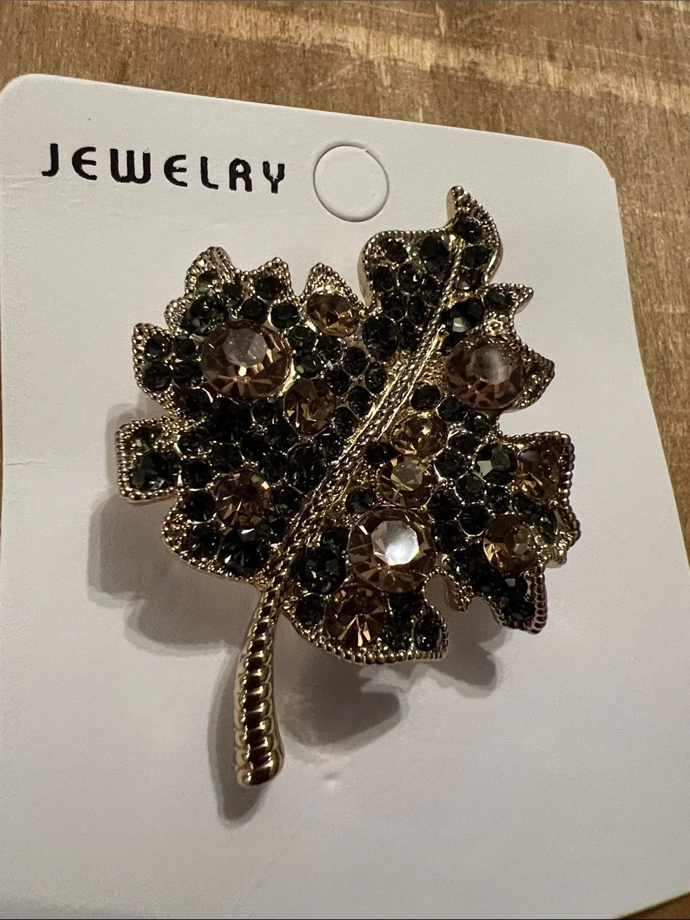 3/$18 Gold Leaf Brooch with Champagne and Black Crystals Lot 6071